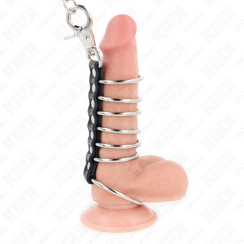 KINK – 7 ANELLI PER PENE IN METALLO DA 3,8 CM A 5 CM COLLEGATI CON PELLE E CATENA IN METALLO 100 CM